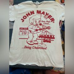 Brand New John Mayer 2019 Tour Tee! Size Medium. Pit To Pit 19” Such An Awesome Tee! White Band Logo Graphic Tee, White Cotton Shirt With Band Logo, Pop Culture Cotton Top With Band Logo, White Casual Top With Band Logo, Casual White Top With Band Logo, White Cotton Band Logo Top, White Cotton Top With Band Logo, John Mayer, Cool Tees