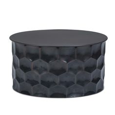 a round table with black plastic covering