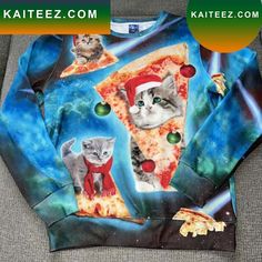 a sweater with cats wearing santa hats and pizza slices on it