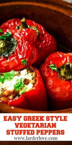 several stuffed red peppers in a bowl with the words easy greek style vegetarian stuffed peppers