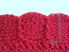 there are three crocheted pieces of yarn on top of each other in red