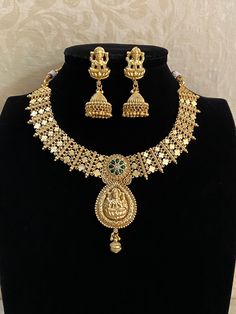 Antique necklace with matte gold finish and earrings beautiful design Elegant Antique Gold Necklaces For Festive Occasions, Elegant Antique Gold Necklace For Festive Occasions, Gold Necklace With Elegant Design For Festive Occasions, Elegant Temple Necklace With Matching Earrings, Gold-plated Jewelry Sets With Matching Earrings, Elegant Antique Gold Kundan Necklace Gift, Gold Plated Jewelry Sets With Matching Earrings, Elegant Gold-plated Gold Necklace, Elegant Kundan Necklace In Antique Gold