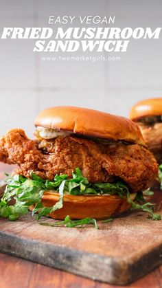 fried mushroom sandwich with lettuce on a cutting board