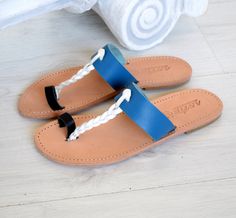 "Blue white black sandals, Greek handmade, Women summer flats, Beach shoes, Boho sandals, Wedding Sandals, Bohemian leather sandals, Beach shoes, ALL ORDERS ARE SHIPPED VIA TNT EXPRESS WORLDWIDE (Please include a phone number at checkout, as it's required by the carrier). The shop Welcome to our shop where you can find comfortable, stylish, handmade, Greek-style sandals and gladiator sandals, in a variety of colors, which will complement any outfit. *The materials All our sandals are exclusively Boho Sandals Wedding, Sandals Wedding, Boho Sandals, Sandals Beach, Chic Sandals, Black Boho, Summer Flats, Wedding Sandals, Shoes Blue