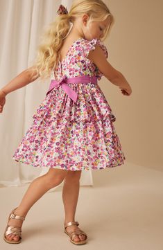 A party-ready dress fluttered in flowers will be a fancy fave for your little darling. Back button closure 100% cotton Machine wash, tumble dry Imported Playful Spring Twirl Dress For Dress-up, Playful Floral Print Twirl Dress For Spring, Playful Floral Print Cotton Dress, Spring Cotton Twirl Dress For Dress-up, Cotton Twirl Dress For Dress-up Occasions In Spring, Spring Twirl Dress With Floral Print For Garden Party, Spring Floral Print Twirl Dress For Garden Party, Floral Print Twirl Dress For Spring Garden Party, Cotton Twirl Dress For Spring Garden Party