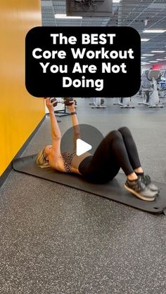 a woman doing the best core workout you are not doing on a mat in an indoor gym