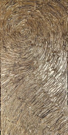 an abstract painting in gold and brown with swirls on the bottom half of it