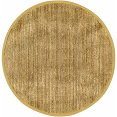 a round rug with an oval design on the top and bottom, in beige color