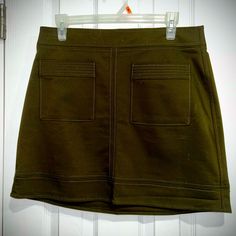 This Is A Cute Skirt In Olive Green, Size 10, From Express, Brand New With Tags Attached, Never Worn, Waiting For A New Owner Teal Skirt, Glitters Skirt, Grey Mini Skirt, Faux Suede Skirt, Gold Skirt, Blue Mini Skirt, Suede Mini Skirt, Purple Skirt, Jean Mini Skirts