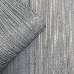 a close up view of a blue and white striped fabric