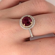 This ring is sure to make a statement with its 8mm 3-carat red ruby center gemstone, embellished with 72 natural earth-mined diamonds, all set in solid 14k dual-tone gold - white and yellow gold. This ring can be a beautiful July birthstone gift for your loved ones! This ring is made with solid 14K Gold and naturally Earth-mined SI / G-H diamonds. As listed, this ring is ready to ship. If you're interested in purchasing this setting with a different center stone please message us! Designer Silver Jewellery, Jewelry Showcases, Double Halo, July Birthstone, Red Ruby, 3 Carat, Natural Earth, Ruby Ring, Earring Findings