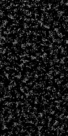 an abstract black and white background with lots of small arrows in the middle, all over