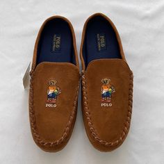 Polo Ralph Lauren Men’s Mocasines Polo Beach Bear Slippers New With Tags Color: Tan Casual Brown Outdoor Slippers, Casual Suede Outdoor Slippers, Casual Non-slip Slip-on Moccasins, Casual Outdoor Suede Slippers, Casual Beach Loafers, Casual Non-slip Round Toe Moccasins, Casual Non-slip Closed Toe Moccasins, Casual Leather Loafers For The Beach, Brown Casual Slippers With Leather Sole