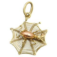 This is a 14 karat gold vintage spider web charm. This adorable spider web charm is beautifully made with a rose gold spider in the center spinning its web to catch delicious insect meals. Charms are great to collect as wearable memories, it has a symbolic and often a sentimental value. This vintage charm can be added to your necklace, charm bracelet or layered with your other favorites. The charm is in very good condition and of high quality. It measures 2.3 cm in length including bail and 1.5 cm wide. Hallmark is present and visible on the bail. Most of our charms come with an open jump ring, which is used to attach them to a bracelet or necklace. We recommend this ring to be closed professionally by soldering them together before wearing - this can be done by your local jeweler. The cha Vintage Spider, Halloween Charms, Necklace Charm, A Rose, Spider Web, Vintage Charms, Charm Pendant, Or Rose, Jewelry Necklace Pendant