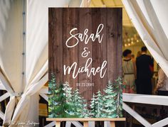 a wooden sign that says welcome to the wedding of nata and michael on it