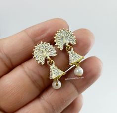 Beautiful fashion wear small jhumki. Light weight earrings. Indian traditional Earrings. Ethnic earrings. White Jhumkas Earrings For Gift, White Round Jhumkas For Diwali, Dual-tone Jhumkas For Diwali Gift, Traditional Cubic Zirconia Jhumkas For Diwali, Hand-set Cubic Zirconia Jhumkas For Celebrations, Indian Traditional Earrings, Earrings Indian Traditional, Jaipur City, Earrings Jhumka