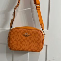 Beautiful Orange Coach Brand New Handbag Coach Bag Orange, Coach Coated Canvas Satchel Bag, Coated Canvas Pouch Shoulder Bag With Gold-tone Hardware, Tan Coated Canvas Bag With Detachable Strap, Gold-tone Coated Canvas Pouch Shoulder Bag, Gold-tone Hardware Coated Canvas Pouch Shoulder Bag, Coated Canvas Crossbody Box Bag For Travel, Coated Canvas Crossbody Bag With Gold-tone Hardware, Travel Crossbody Box Bag In Coated Canvas