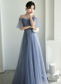 Elegant Homecoming Gown With Tulle Skirt, Floor-length Tulle Ball Gown For Banquet, Formal Evening Dress With Tulle Skirt, Blue Tulle Evening Dress For Formal Occasions, Tulle Evening Dress For Homecoming Party, Formal Tulle Bridesmaid Dress With Sweep Train, Floor-length Tulle Evening Dress, Floor-length Tulle Gown For Banquet, Tulle Evening Dress For Prom Season