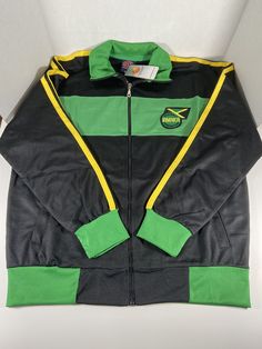 Jamaica Track Top Jacket ZIP Up High Quality. Full Zipper Jacket with Two (2) Pockets. Made with high quality, breathable fabric water Resistant and Machine Washable. 65% polyester 35% cotton. This sports Jacket or Top is perfect for layering up when heading off to the gym, or wearing something stylish when dressing casually. Crafted with a lightweight, breathable material, this Jacket is the perfect compliment to any activewear wardrobe. It comes with two pockets and a full zip front for a secu Urban Cotton Sport Outerwear, Urban Cotton Outerwear For Sports, Green Cotton Sporty Track Jacket, Cotton Track Jacket With Zipper For Streetwear, Green Sporty Tracksuit With Long Sleeves, Sporty Long Sleeve Fleece Jacket With Zip Fly, Sporty Cotton Outerwear For Outdoor Activities, Cotton Athleisure Track Jacket With Zipper, Green Cotton Track Jacket