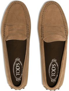 Step into style and comfort with these classic loafers from Tod's. With their rich brown suede and sleek crossover strap detail, these slip-on almond toe shoes are the perfect blend of sophistication and ease. Brown suede material Crossover strap detail Slip-on style for easy wear Almond toe for a stylish touch Flat rubber sole for all-day comfort Classic Loafers, Versace Bags, Birkin 25, Driving Shoes, Suede Material, Toe Shoes, Lv Bag, Fendi Bags, Brown Suede