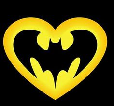 batman symbol in the shape of a heart on a black background with yellow glows