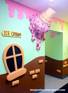 an ice cream themed office cubicle decorated in pink and blue