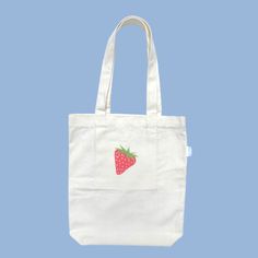 This bright red strawberry tote bag will add a pop of colour and liveliness to your wardrobe! Pair our strawberry tote bag with a cute little picnic outfit and you will be looking ‘berry’ sweet! All of our designs are double-sided so that you have the option to wear a more simple look, or a more bold look! Our tote bags also have an inner pocket! It is the perfect size to hold your phone, wallet, chapstick, and any little trinkets so you don’t have to dig around the bottom of your tote bag! Features: Inner pocket Fits laptop Spacious compartment Double-sided design Designed in Australia Artwork by Mel Instagram: melbdesign_ Material: 100% Cotton Calico Approximate Dimensions: Length: 40cm, Width: 34cm Handle length: 35cm Pocket: 17cm x 17cm Care instructions: Hand wash with cold water and Cute Cotton Shoulder Bag For Spring, Cute Red Bags For Everyday Use, Cute Cotton Bags For Spring, Cute Everyday Canvas Bag, Summer Red Cotton Canvas Bag, Cute Cotton Shoulder Bag, Red Cotton Canvas Bag For Summer, Playful Red Everyday Bag, Red Bag With Strawberry Print As Gift