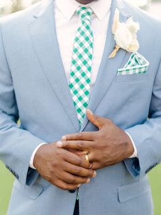 This jacket is a new addition and is quickly becoming our favorite! The light steel blue color will stand out in photos and was designed with the trendsetting bridal party in mind. Perfect for spring, summer, and fall, we can't wait to see how our couples accessorize this blue suit! Dapper Blue Blazer With Notch Lapel, Spring Notch Lapel Suit For Groom, Spring Suits For Grooms, Blue Spring Wedding Suit, Light Blue Suit Jacket, Groomsman Proposal Box, Groomsmen Tuxedos, Light Blue Suit, Groomsmen Socks