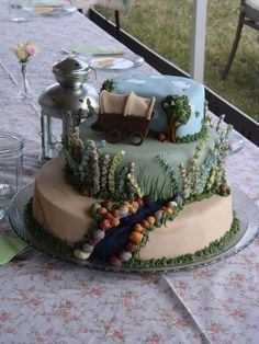 a decorated cake sitting on top of a table