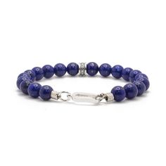 Handcrafted with stunning 8mm Lapis Lazuli, each bead radiates deep blue hues. A singular silver Maya David bead becomes the centerpiece, adding a touch of distinction to this bold and timeless piece. Sterling Silver Lapiz Lazuli 8mm Thickness Push Clasp Handcrafted in LA Lapis Lazuli: Wisdom, Protection, Intellectual Clarity, Emotional Healing Determining your bracelet size: Encircle your wrist with a flexible tape measure and record the measurement. Because of the larger bead size, add 3/4 to Pearl Jewelry Gift, Stacked Jewelry, Gold Collection, Emotional Healing, Tape Measure, Blue Hues, Bracelet Sizes, Ring Necklace, Pearl Jewelry