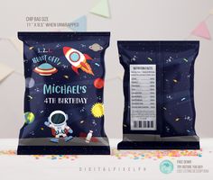 two bags of birthday cake with space theme