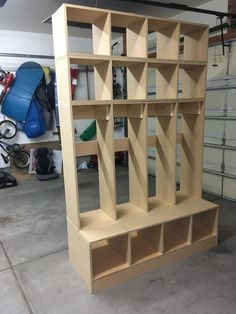 the shelves are made from plywood and have been built into each other for storage