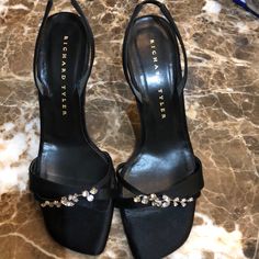 Just Like New. Only Worn Once! Beautiful. Sophisticated. Black Satin Sandal With Vine Rhinestone Decor. 3.5 Inch Heel. Size 7.5. Glamorous Evening Sandals With Almond Toe, Glamorous Formal Sandals With Almond Toe, Formal High Heel Sandals With Rhinestones, Elegant Dinner Sandals With 4-inch Heel, Formal Embellished High Heel Sandals, Elegant Evening Sandals For Formal Occasions, Elegant Formal Sandals For Evening Events, Formal Embellished Fitted Sandals, Elegant Formal Evening Sandals