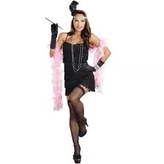 a woman in a black dress and pink feather boa is posing for the camera