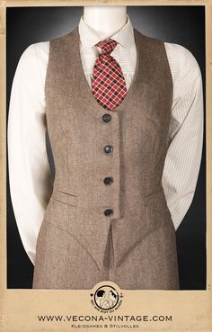 "This menswear inspired waistcoat is masterfully fitted and hugs your female curves like a dream! Paired with the matching trousers you achieve the fabulous lady dandy look Marlene Dietrich rocked in the 1930s. Delicate details like the two welt pockets and a patch pocket provide room for a pocket square to refine the look even further. The back strap allows for width adjustment at the waist to fit your shape perfectly! In case you feel even more adventurous wear it with our matching MRS. GOODWO Fitted Single-breasted Tweed Vest, Fitted Brown Tweed Jacket With Herringbone Pattern, Fitted Wool Vest With Single Breasted Design, Fitted Wool Vest Single Breasted, Fitted Wool Single Breasted Vest, Wool Single-breasted Fitted Vest, Fitted Wool Single-breasted Vest, Fitted Herringbone Vest For Fall, Elegant Fitted Tweed Vest