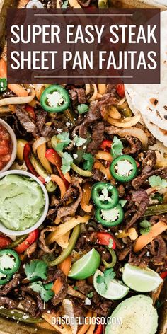 an easy steak sheet pan fajita recipe with peppers, onions and green sauce