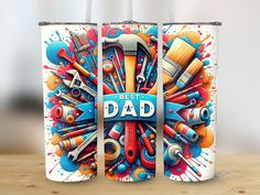 two canisters with the words best dad and tools on them, sitting on top of a wooden table