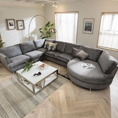 a living room with two couches and a coffee table