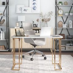 a desk with a laptop on it in front of some bookshelves and shelves