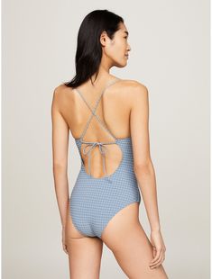 Tommy Hilfiger women's swimwear. This retro-check print one-piece swimsuit features a self-tie straps, a center cut-out, and a low-cut back.  Material: 72% Recycled Nylon ,  Polyamide, 17% Polyesther Pes. Tommy Hilfiger Swimwear For Spring Beachwear, Tommy Hilfiger Beachwear For Spring, Tommy Hilfiger Spring Beachwear, Tommy Hilfiger Beachwear, Gingham Swimwear With Adjustable Straps For Poolside, Poolside Gingham Swimwear With Adjustable Straps, Tommy Hilfiger Swimwear For Poolside Summer, Tommy Hilfiger Beachwear Swimwear, Tommy Hilfiger Beachwear Swimwear For Beach Season