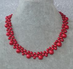 I make the necklace to use 6 mm and 10 mm red glass pearl , red glass pearls.The necklace length is 16 inches .IT has a 2 inch long adjustable chain. I can make different type necklace to your requirements,Please feel free to contact me if you have any question. Thank you so much. . Matching earring: https://www.etsy.com/shop/glasspearlstore/search?search_query=red+earring&order=date_desc&view_type=list&ref=shop_search Matching bracelet: https://www.etsy.com/shop/glasspearlstore/sear Red Pearl Necklace, Red Beaded Necklaces, Flower Girl Bracelets, Bride Necklace, Wedding Red, Red Pearl, Pearl Necklace Wedding, Jewelry Making Earrings, Beaded Necklace Diy