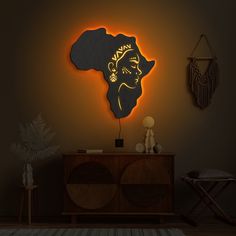 🌍 Illuminate your space with the profound beauty of our high-quality "African Woman Wall Art LED"--a striking fusion of culture, artistry, and illumination that elevates your home decor. This isn't just wall art; it's an electrifying tribute to the grace and strength of African heritage, transforming any room into a vibrant celebration of diversity and womanhood. 💡 Bask in the warm luminescence of our LED African Woman Silhouette, and let it infuse your space with the rich energy of African la East African Art, African Room Decor Ideas, African Bedroom Ideas, African Queen Art, African Femininity, African Decor Bedroom, Afrohemian Decor, African Themed Living Room, African Decor Living Room