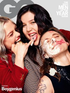 three women are posing together on the cover of gq magazine, with their faces covered in frosting