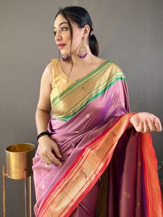 Wear this gorgeous dusty pink paithani silk saree and become the cynosure of all eyes. Crafted with meticulous attention to detail, this stunning saree is perfect for weddings, receptions, functions, and any other event where you want to be the center of attraction.
Made from high-quality silk material, this saree boasts a rich and luxurious dusty pink color. The zari weaving work adds a touch of elegance and sophistication, making it a truly exquisite piece. The saree also features an elegant r Wear Saree, Blouse Material, Traditional Sarees, Silk Material, Beautiful Saree, Pink Silk, Wedding Wear, Festival Wear, Blouse Piece