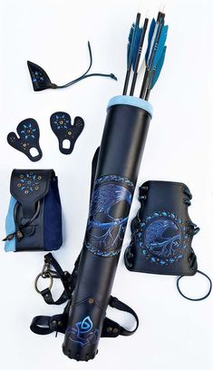 an umbrella with some arrows in it and other accessories