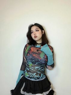 𝔇𝔢𝔱𝔞𝔦𝔩𝔰: Style: Darkwear, Streetwear, Gothic, Y2K Material: Spandex (Stretchable) This mesh top features a graffiti pattern and green patchwork sleeves, which can be your inspiration for making a y2k look. With its stretchy fabric, this top can perfectly fit your body and help you become more confident when going out. Get free shipping with a purchase of over 80 $ at our store SIZE LENGTH CHEST SLEEVE WAISTS 21 in 32 in 26 in 26 inM 21 in 33 in 27 in 28 inL 22 in 35 in 27 in 29 inItem mea Y2k Mesh Top With Graphic Print, Black Y2k Stretch Mesh Top, Black Stretch Mesh Top Y2k Style, Black Stretch Mesh Top In Y2k Style, Black Y2k Mesh Top For Spring, Black Mesh Y2k Top For Spring, Black Mesh Top Y2k Style For Spring, Black Fitted Y2k Style Mesh Top, Fitted Black Y2k Mesh Top