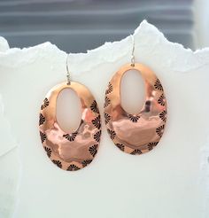 "Handcrafted large Oval Copper Earrings. These polished Copper Earrings have been handmade and come on 925 Sterling Silver Ear wires. They have been stamped and lightly oxidize but will darken over time which is a natural feature of copper. You can gently wash these earrings with soap and water to remove lotions, sprays etc. Dry them completely before you store them. Including the ear wires these earrings are 2 5/8\" long and 1 3/8\" wide. They are large scale earrings and very lightweight so they won't tug on your earlobe. Step up your style game with these stunning Copper Drop Dangle Earrings. Handcrafted with exquisite attention to detail, these earrings feature a sleek copper design that effortlessly catches the light. The dangle style adds movement and elegance to any outfit, making t Scale Earrings, Copper Design, Vero Beach Fl, Vero Beach, Drop Dangle Earrings, Outfit Making, Earrings Unique, Bohemian Earrings, Copper Earrings