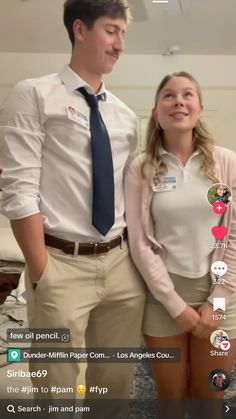 a man and woman standing next to each other in front of a bed with the caption on their phone