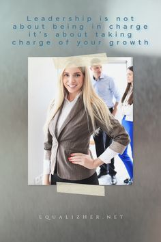 a woman with long blonde hair standing in front of a group of businesspeople