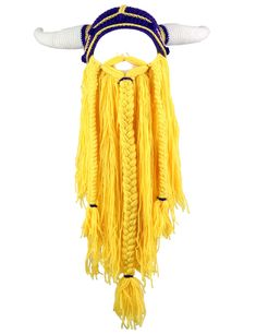 a yellow headdress with horns and braids hanging from it's side